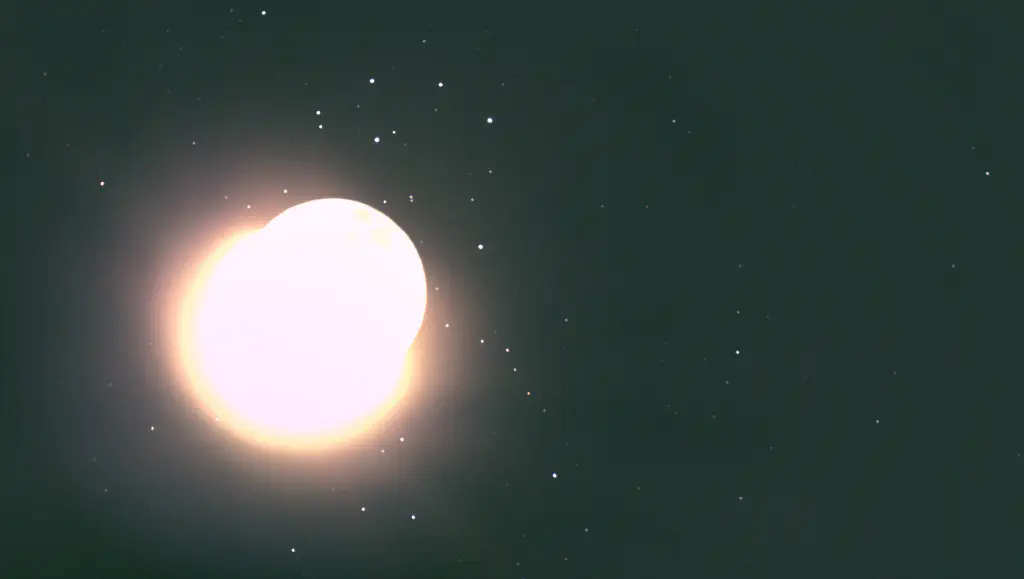 amateur astrophoto of the Moon occulting the Pleiades